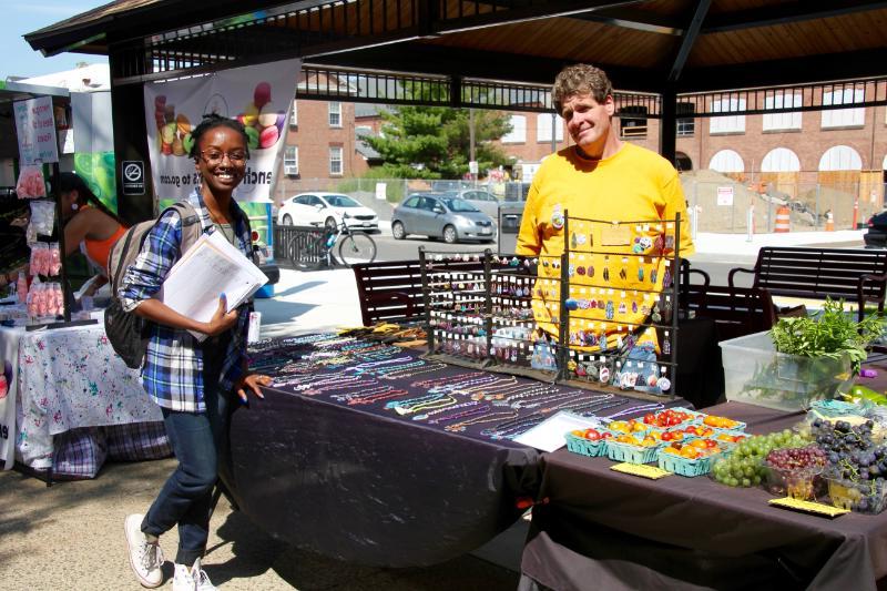 student buying handcrafted jewelry